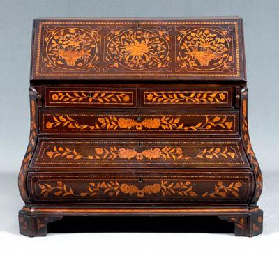 Appraisal: Dutch marquetry inlaid bomb eacute desk elaborately inlaid top and