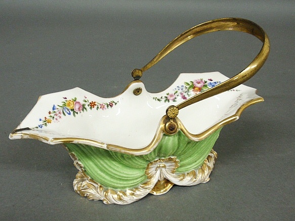 Appraisal: - French porcelain basket with extensive floral decoration and brass