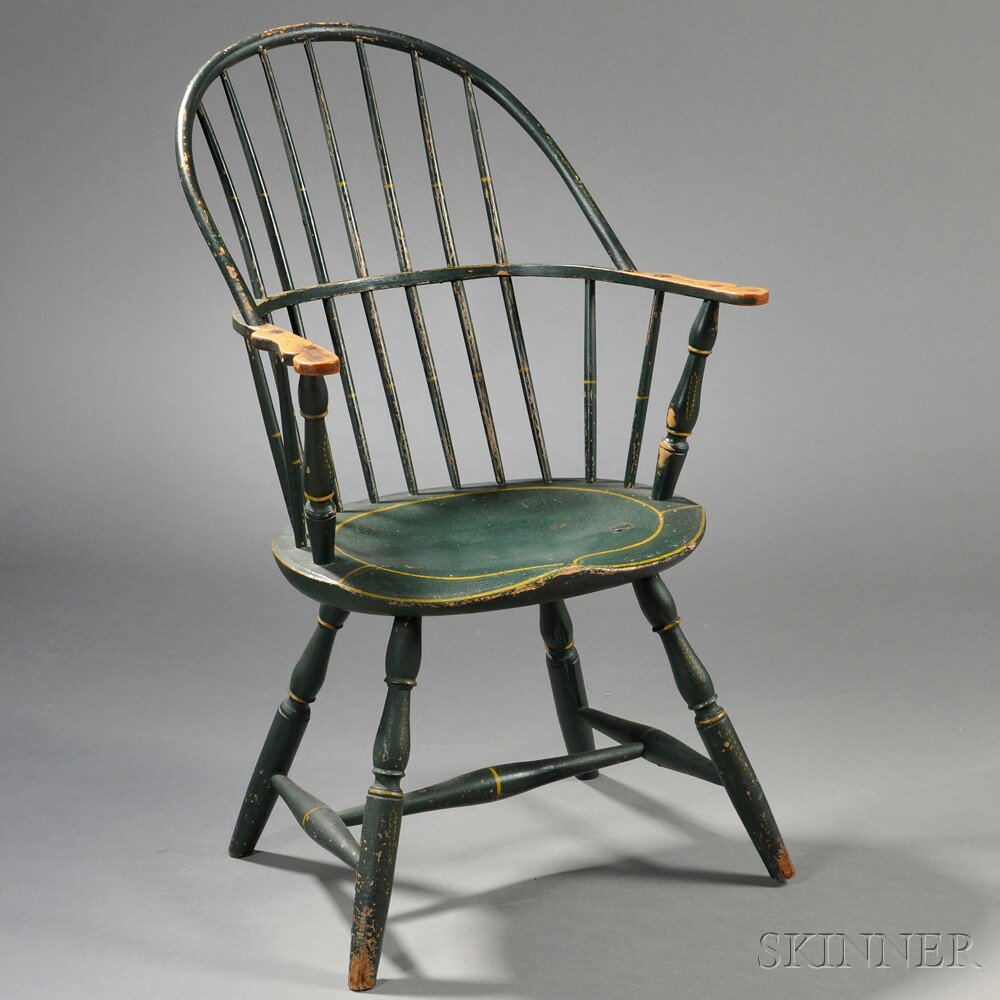 Appraisal: Green-painted Sack-back Windsor Chair New England c with shaped saddle