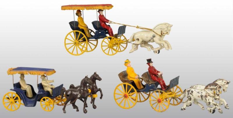 Appraisal: Lot of Horse-Drawn Surrey Toys Description Includes two Kenton cast