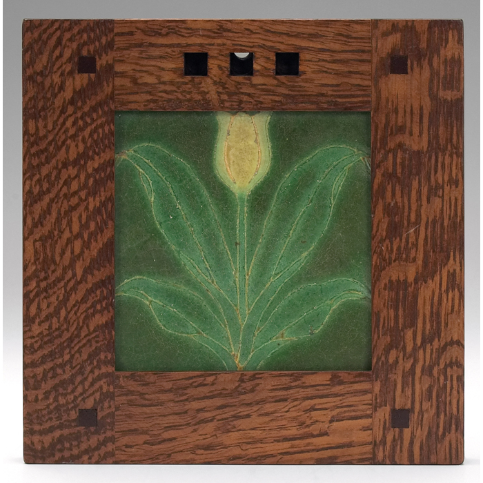 Appraisal: Grueby tile tulip design on a green background initials DC