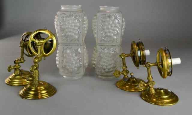 Appraisal: NIAGRA LIGHT CO BRASS WALL SCONCESFour brass arm wall sconces