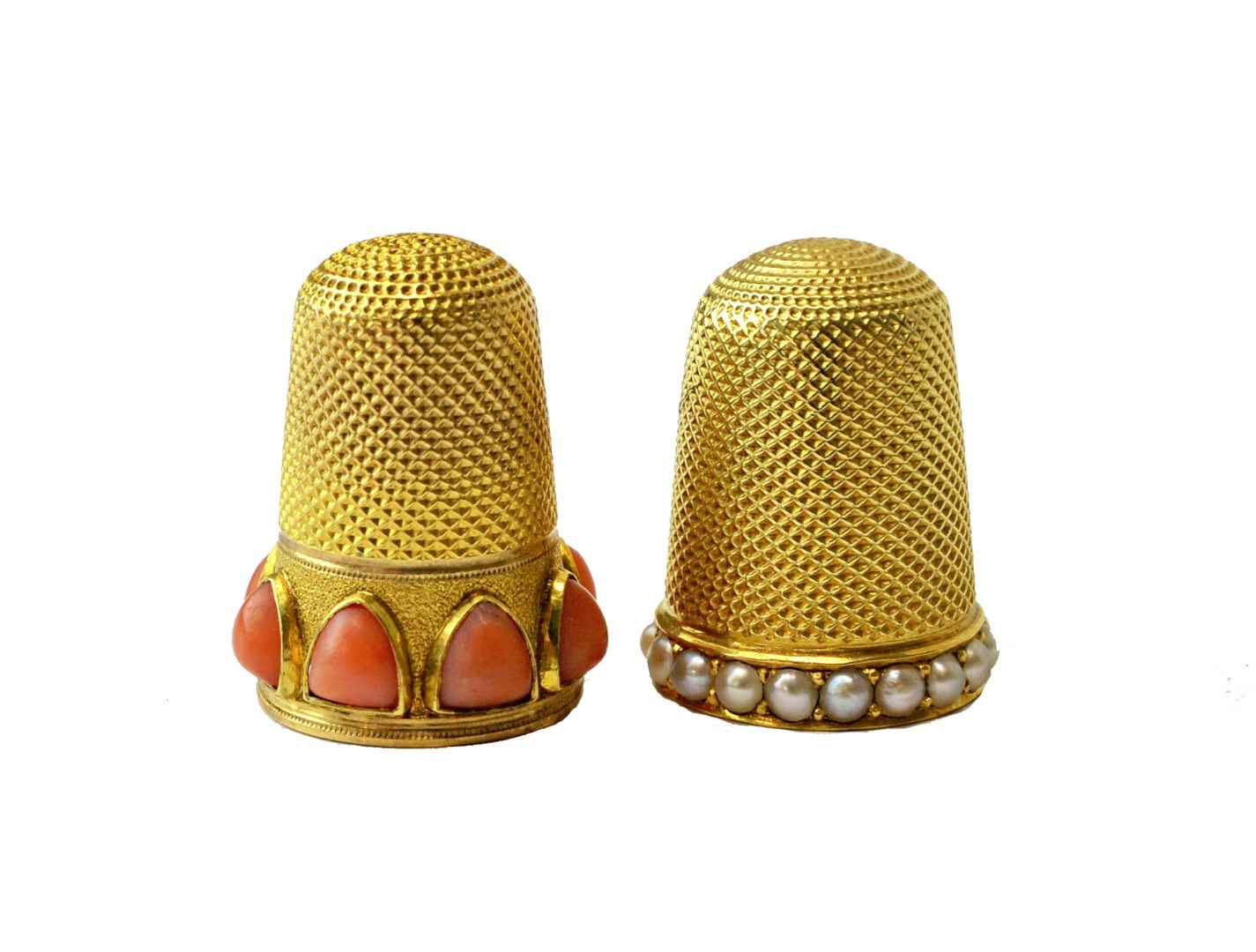 Appraisal: Two late th century gold thimbles the first with band