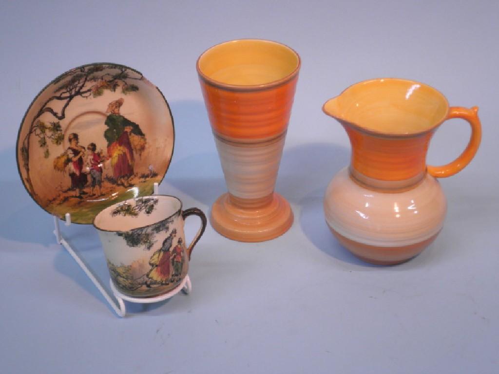 Appraisal: A Shelley jug decorated with bands of orange and brown