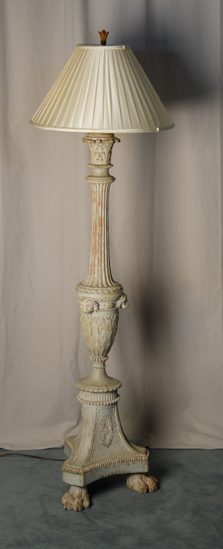 Appraisal: A Continental Carved Pine Adams-style Floor Lamp classically carved ornate