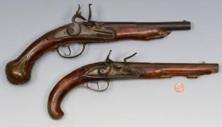 Appraisal: Flintlock pistols one Geromino Fernandez Two th century Continental flintlocks