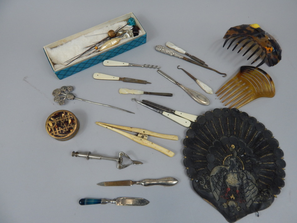 Appraisal: Miscellaneous items to include hat pins a simulated tortoiseshell comb