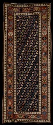 Appraisal: PERSIAN LONG RUG The cobalt field worked with tightly woven