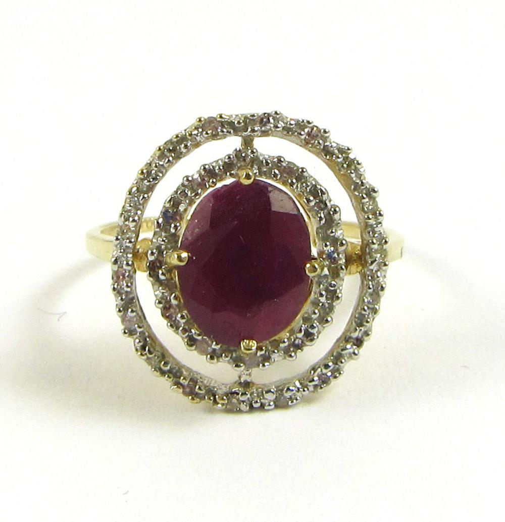 Appraisal: RUBY DIAMOND AND TWO-TONE GOLD RING The k yellow and