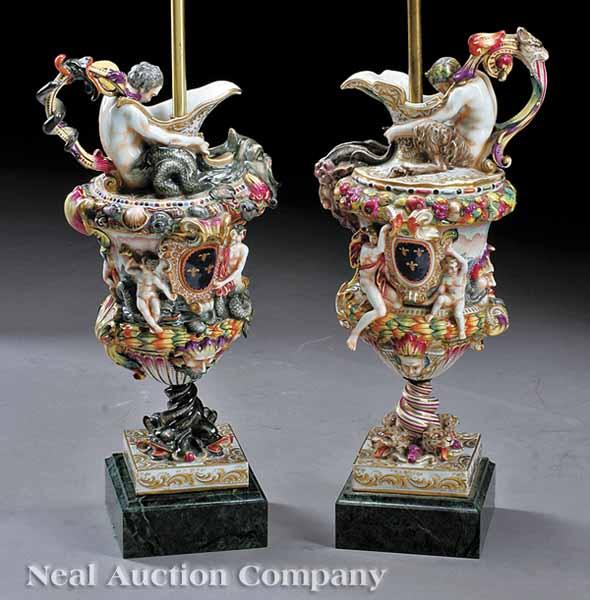 Appraisal: A Pair of Capo di Monte Porcelain Ewers mounted as