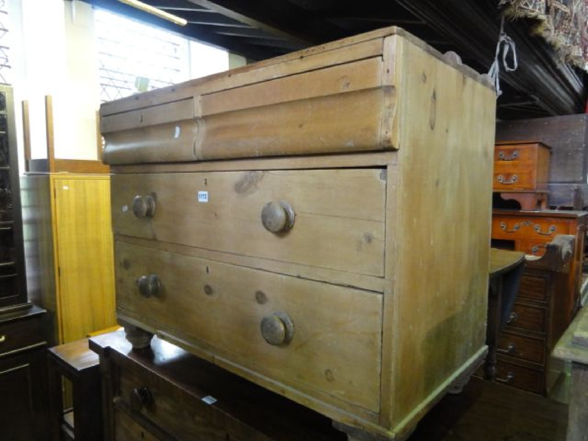 Appraisal: A small Victorian stripped pine bedroom chest of two long