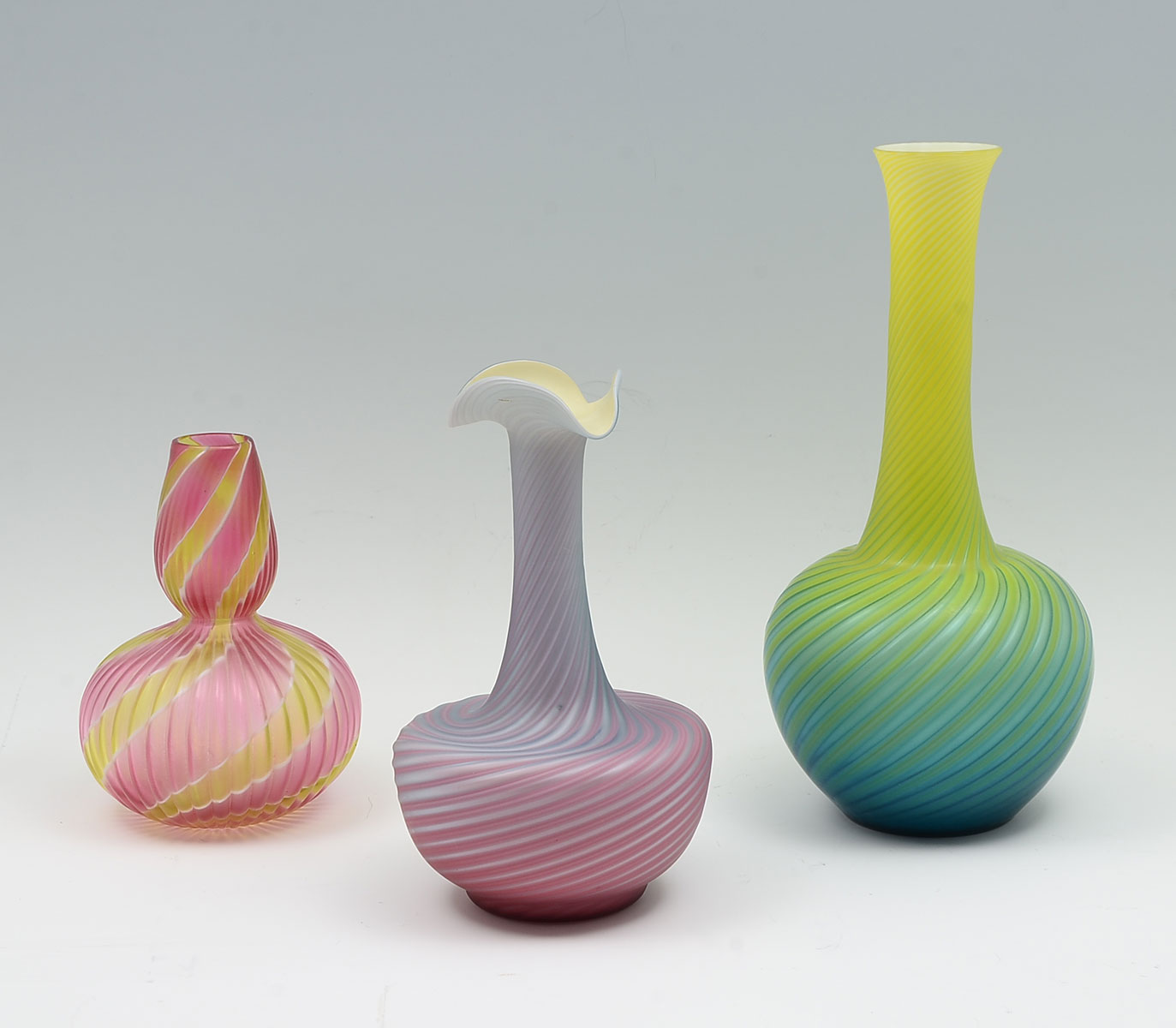 Appraisal: PIECE STEVEN MILLIAMS SPIRAL ART GLASS VASES Comprising - Steven