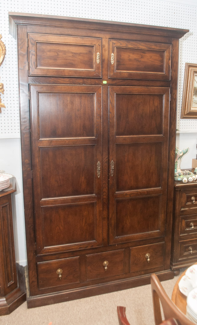 Appraisal: Solid oak linen cabinet