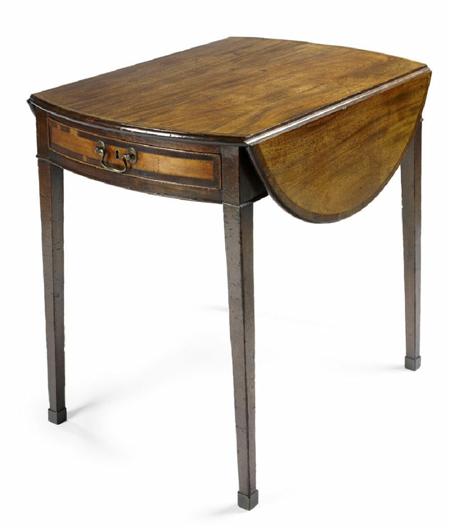 Appraisal: A George III mahogany and crossbanded Pembroke table the oval