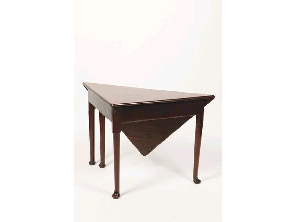 Appraisal: A GEORGE II MAHOGANY ENVELOPE TABLE with a folding triangular