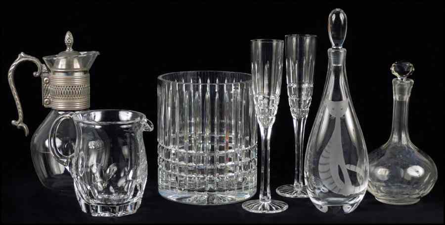 Appraisal: THREE GLASS DECANTERS Together with a crystal ice bucket two