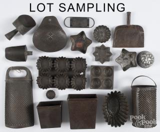 Appraisal: Tinware ca to include molds scoops graters etc Provenance Barbara