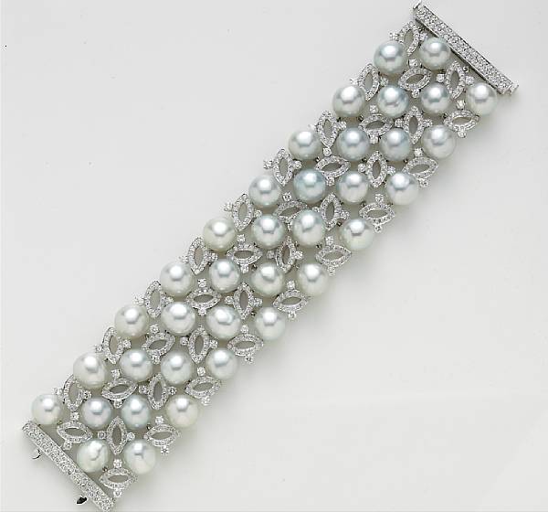 Appraisal: A diamond and baroque South Sea cultured pearl wide bracelet