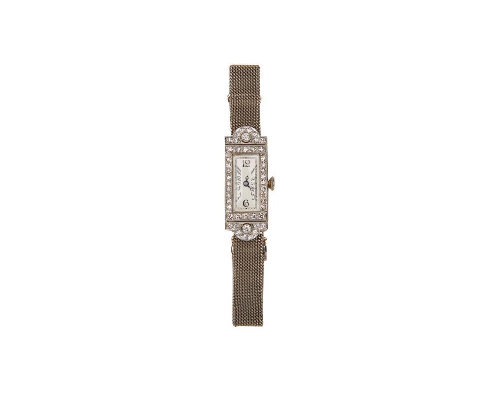 Appraisal: K Gold and Diamond Wristwatch the bezel set with full-