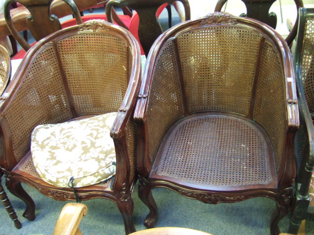 Appraisal: A pair of Louis XV style mahogany framed bergeres the