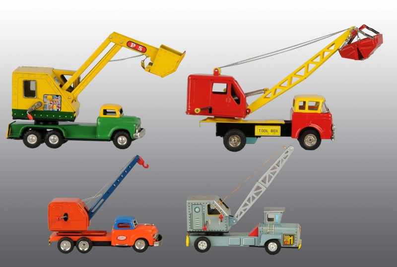 Appraisal: Lot of Tin Litho Crane Truck Friction Toys Description Japanese