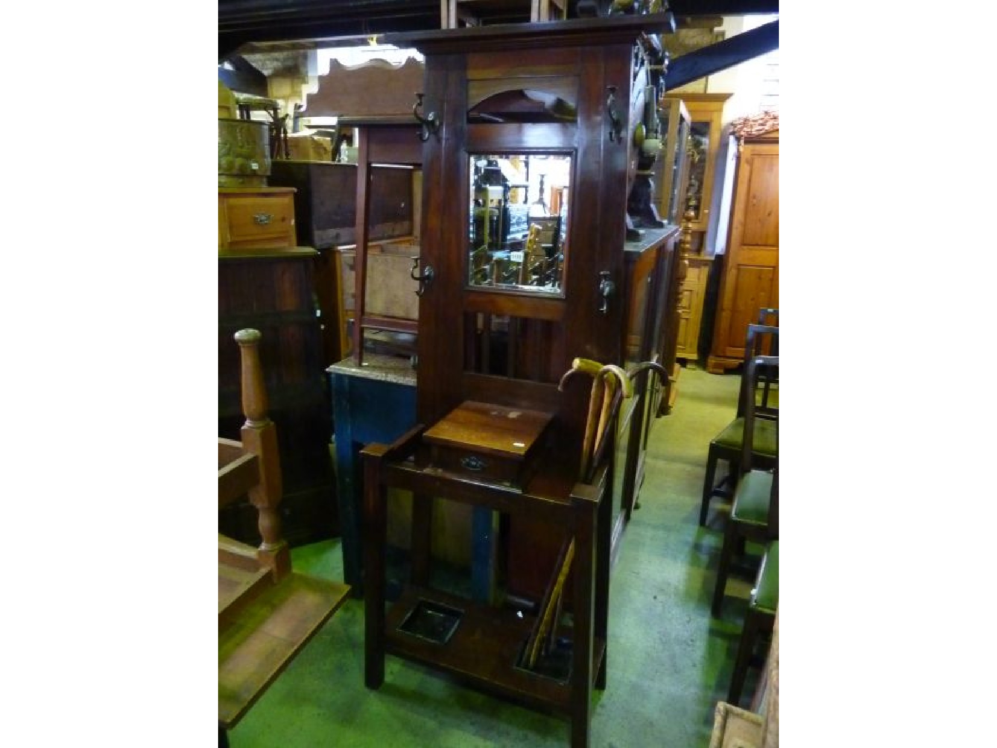 Appraisal: An Art Nouveau walnut hall stand of full height with