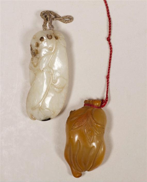 Appraisal: TWO JADE AND AGATE PENDANTS China th th c L