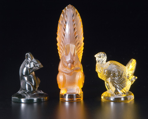 Appraisal: R LALIQUE Three letter seals Souris topaz Ecureuil amber and