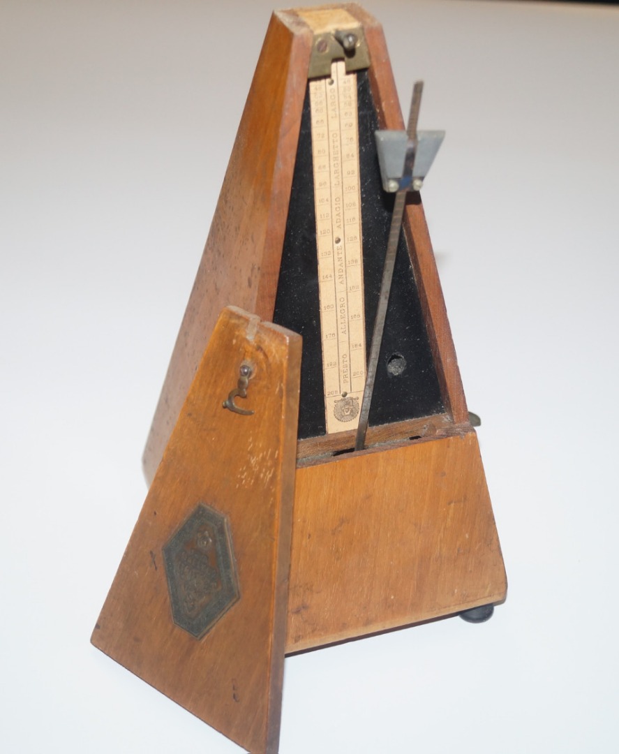 Appraisal: A Paquet mahogany cased - design metronome the typical tapering