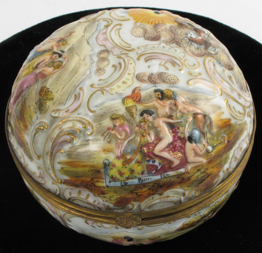 Appraisal: CAPODIMONTE ROUND COVERED PORCELAIN BOX having hand painted raised classical