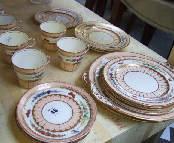 Appraisal: A Victorian porcelain tea service painted with butterflies and flowers