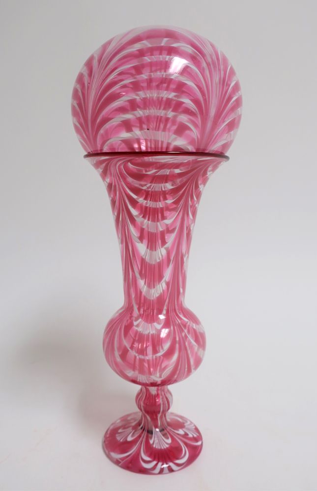 Appraisal: Free-Blown Red and White Witch Ball on Vase Loop decorated