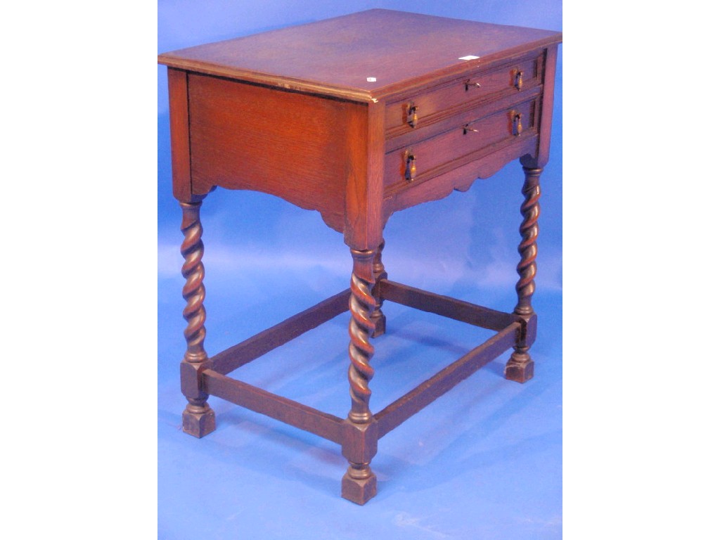 Appraisal: A fitted two drawer cutlery side table with barley twist