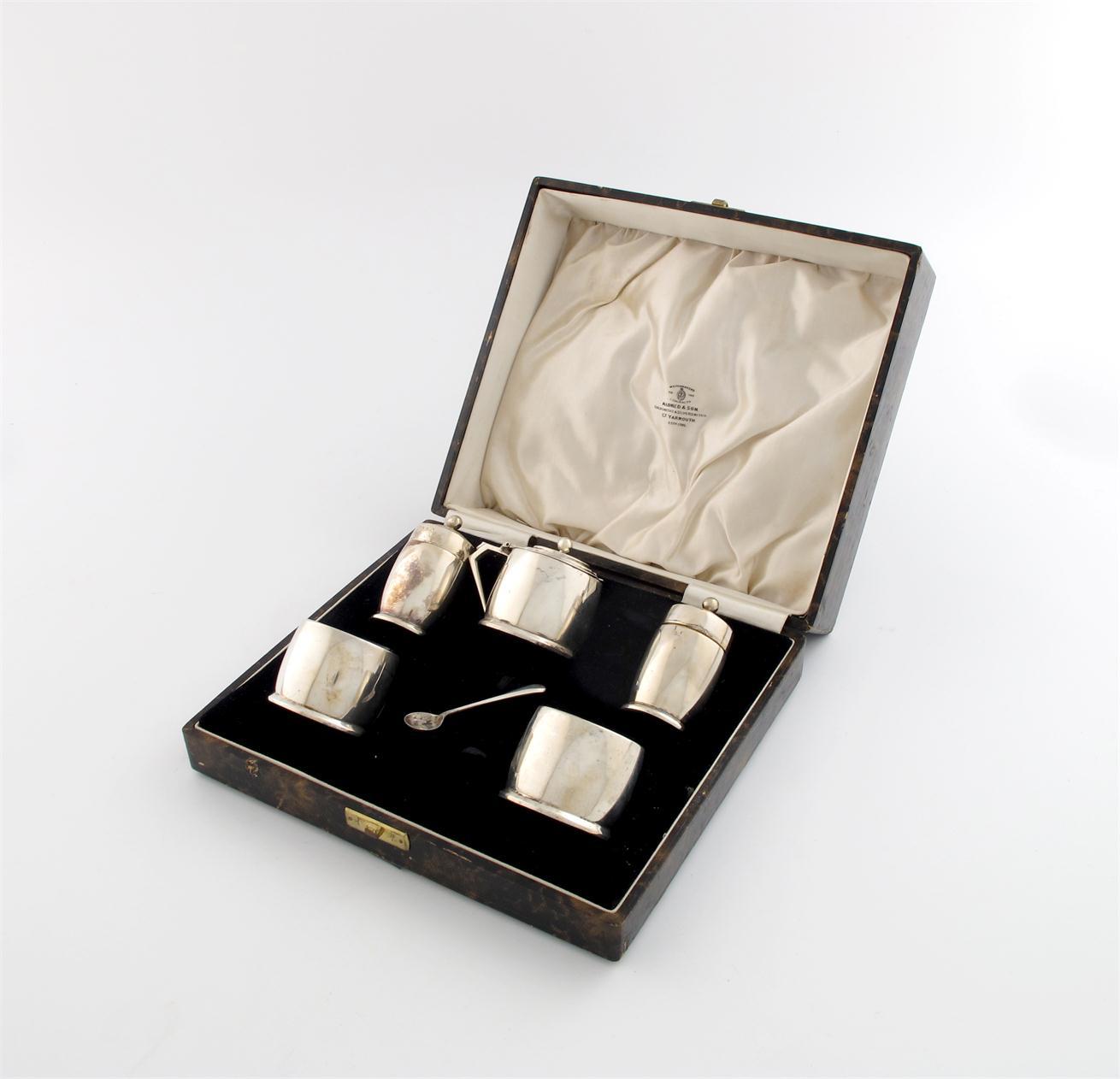 Appraisal: A five-piece silver condiment set