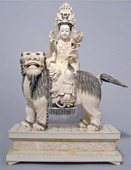 Appraisal: Chinese elephant ivory model of Quanyin on a mythical beast