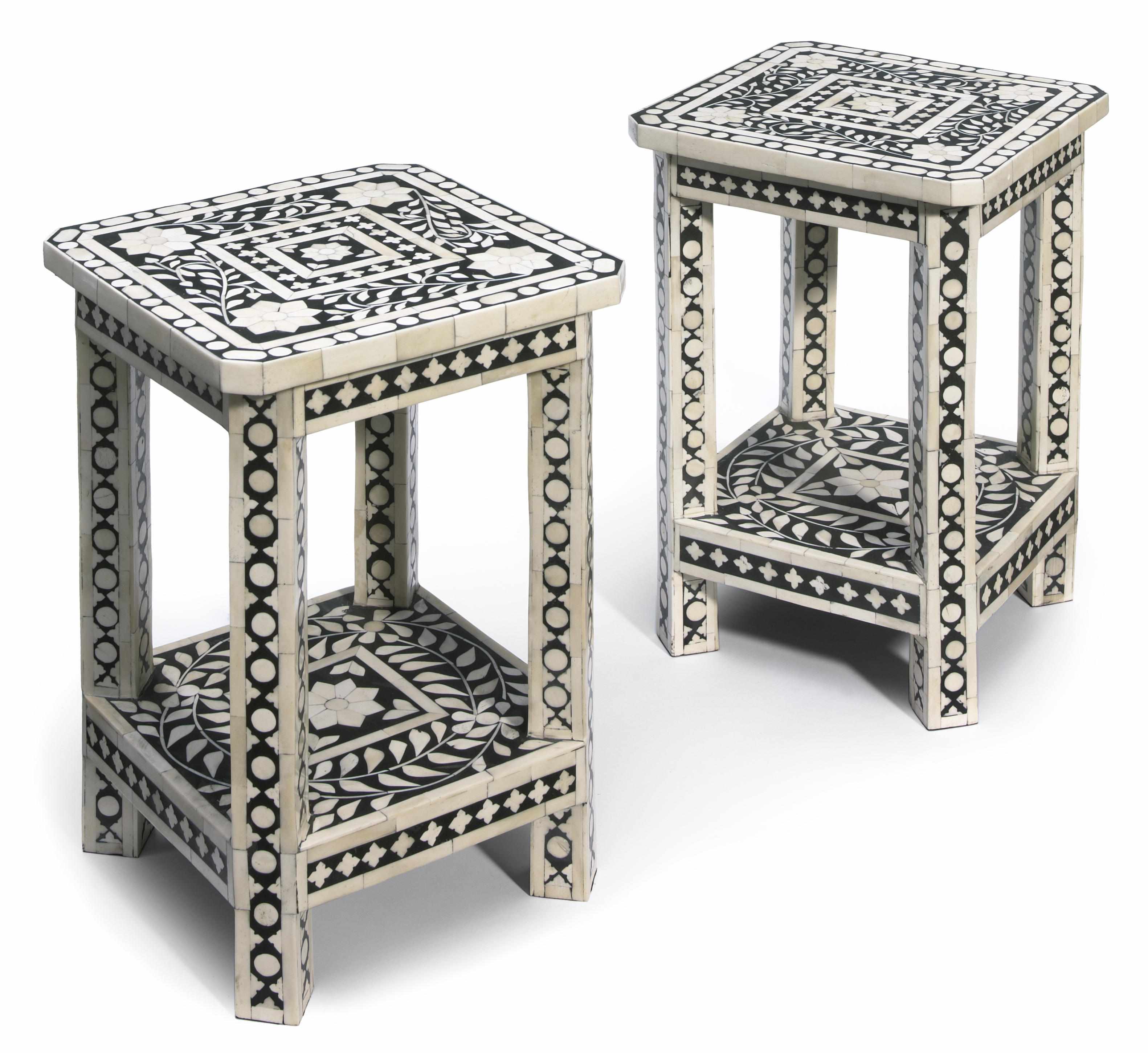 Appraisal: A pair of modern Indian black and white polished wood