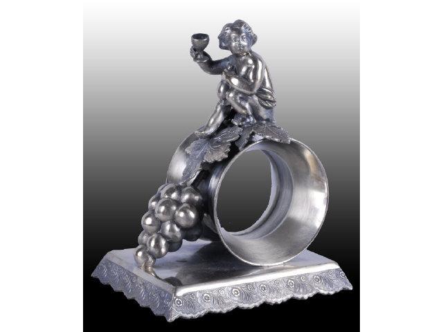 Appraisal: Draped Cherub with Wine Glass Figural Napkin Ring Description Cherub