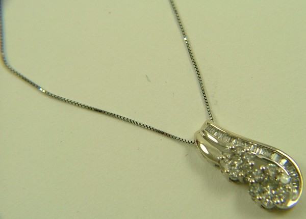 Appraisal: DIAMOND AND TEN KARAT WHITE GOLD PENDANT NECKLACE the pendant