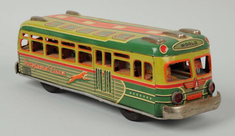 Appraisal: Earlier Japanese Tin Greyhound Bus This Japanese Greyhound bus has