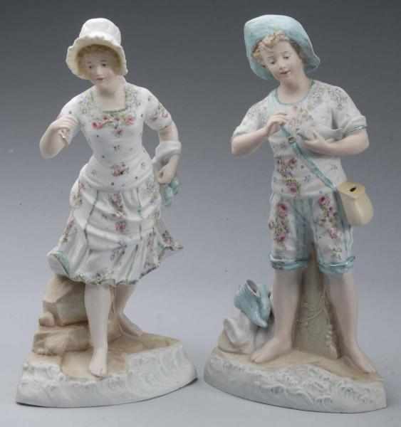 Appraisal: Pair of Heubach Bisque Figurines Description Incised with sunburst mark