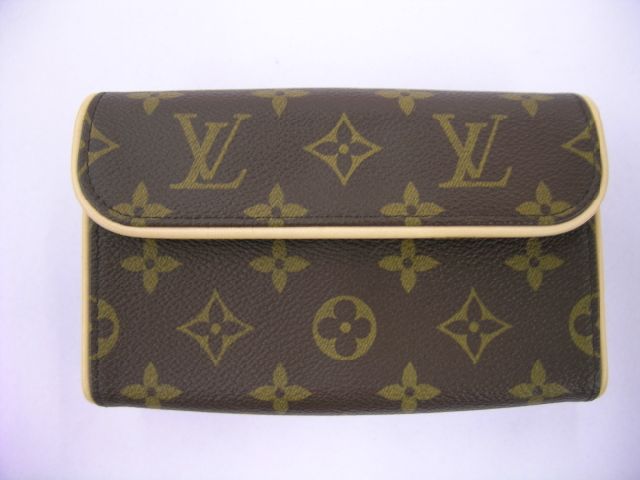 Appraisal: Louis Vuitton Pochette Florentine monogram canvas belt clutch date stamp