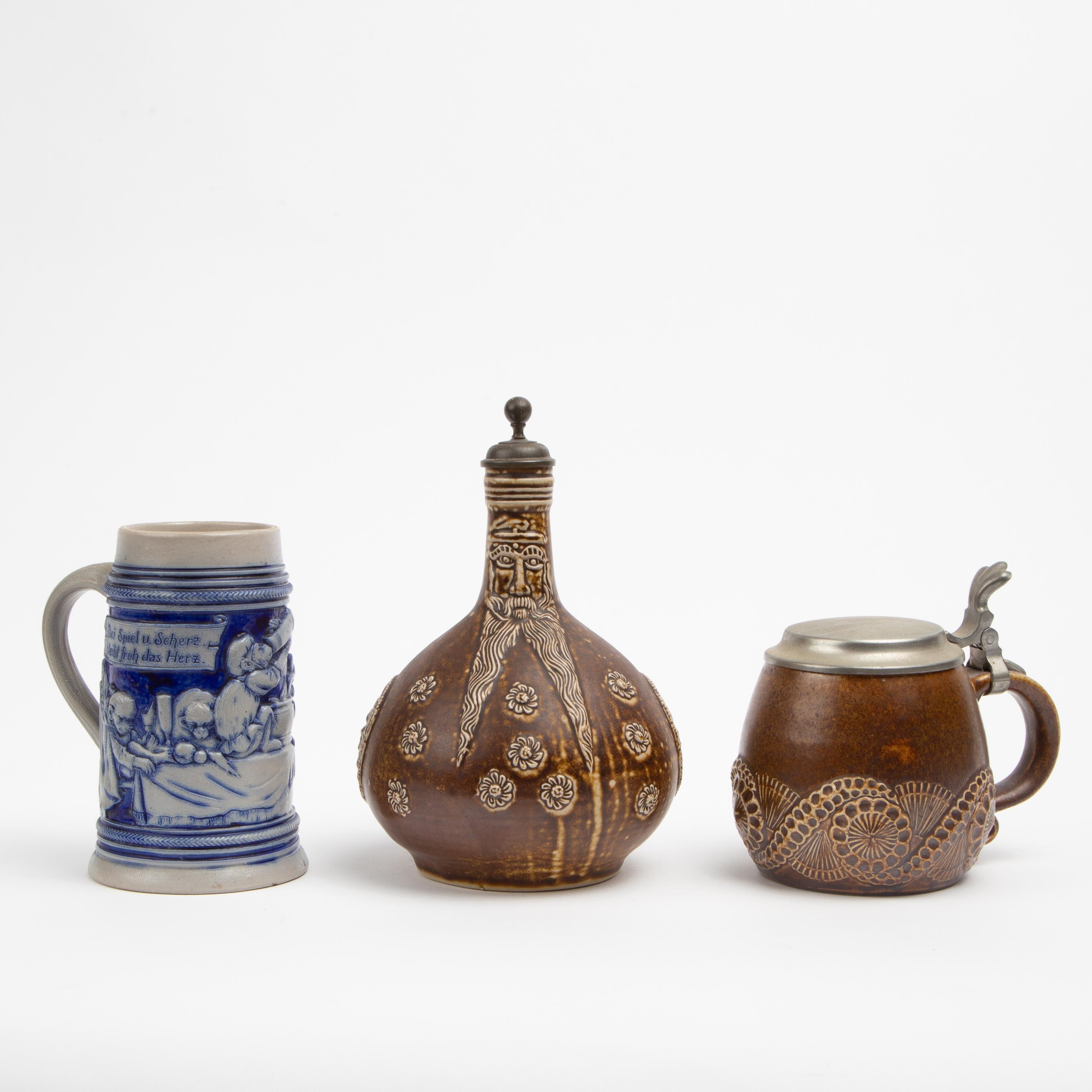 Appraisal: MERKELBACH STONEWARE JUG AND TWO STEINS Reinhold Merkelbach German stoneware