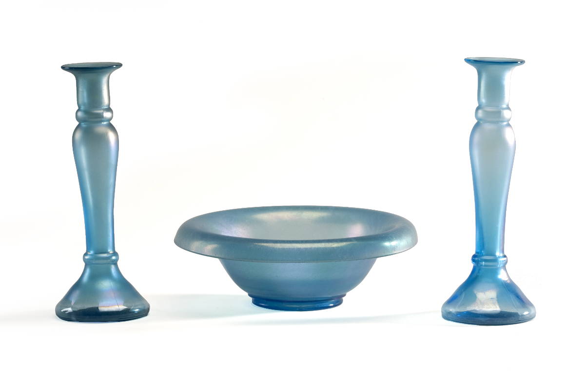 Appraisal: AMERICAN BLOWN-MOLDED GLASS CENTERBOWL AND PAIR OF CANDLESTICKS IN IRIDESCENT