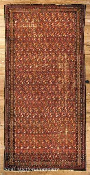 Appraisal: An Antique Hamadan Carpet c red ground interesting geometric motifs