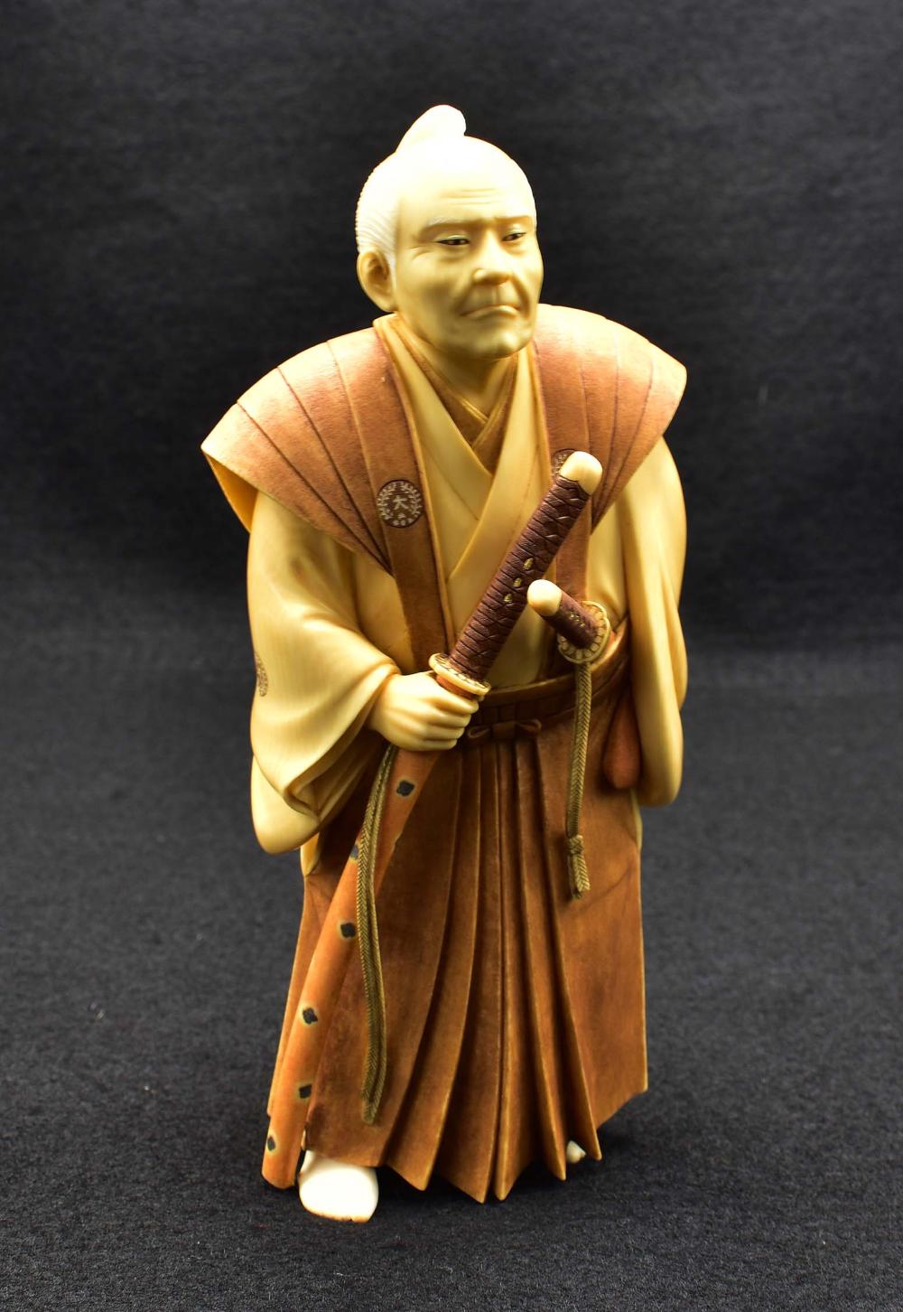 Appraisal: FINE JAPANESE OKIMONO OF A SAMURAI WITH HIS DAISHOMeiji Period