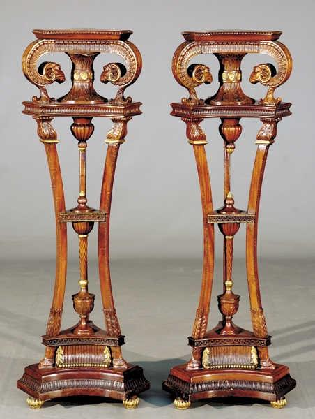 Appraisal: Pair Continental carved giltwood and mahogany torcheres trefoil tiers divided