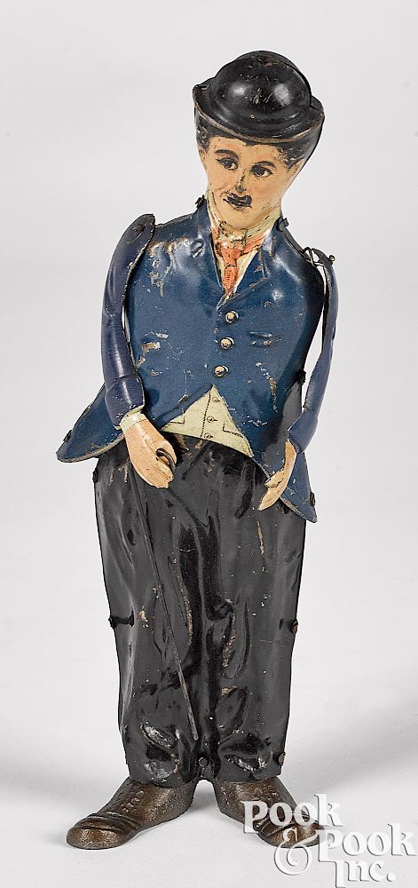 Appraisal: Gunthermann tin clockwork Charlie Chaplin Gunthermann lithograph tin clockwork Charlie