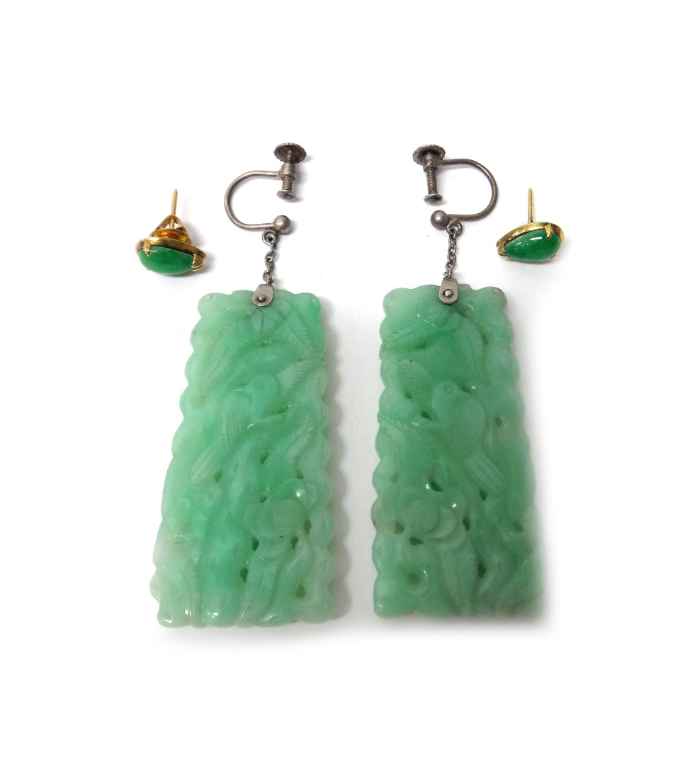 Appraisal: A pair of carved jade pendant earrings each in a