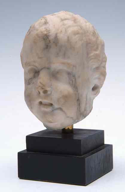 Appraisal: A ROMAN CARVED WHITE MARBLE HEAD OF A BOY set