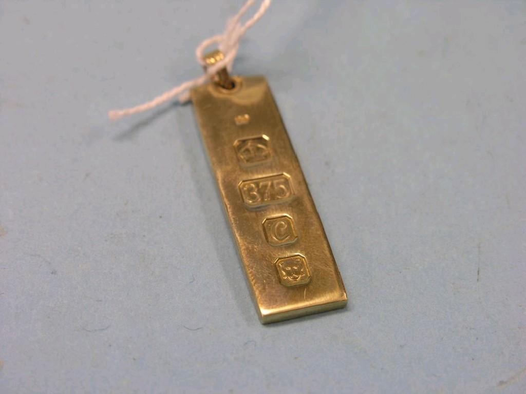 Appraisal: A ct gold ingot pendant grams